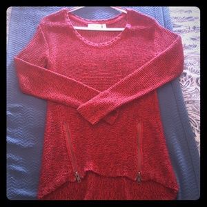 Red and black cable knit sweater